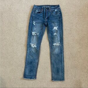 American eagle Tom girl button front distressed blue jeans in size 0